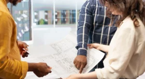 clients-touring-office-space-with-real-estate-expert-discussing-property-layout